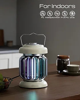 Indoor insect trap on kitchen counter with glowing blue light, designed to catch flies, mosquitoes, moths, and gnats.