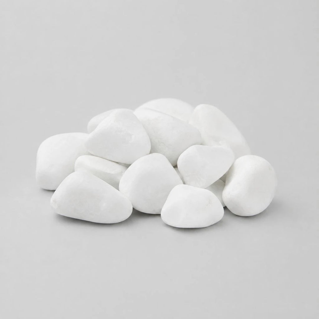 A pile of smooth, rounded white decorative stones in smallest size on a plain light gray background.