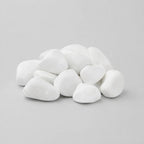 A pile of smooth, rounded white decorative stones in smallest size on a plain light gray background.