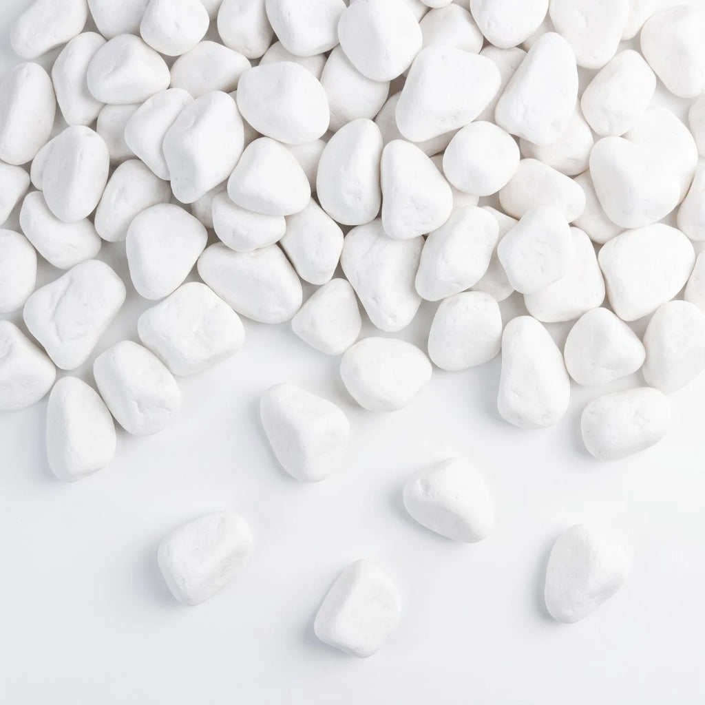 large white cobbles - white decorative pebbles scattered on a clean white background.