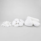 Various sizes of pure white pebbles displayed on a light gray seamless background.